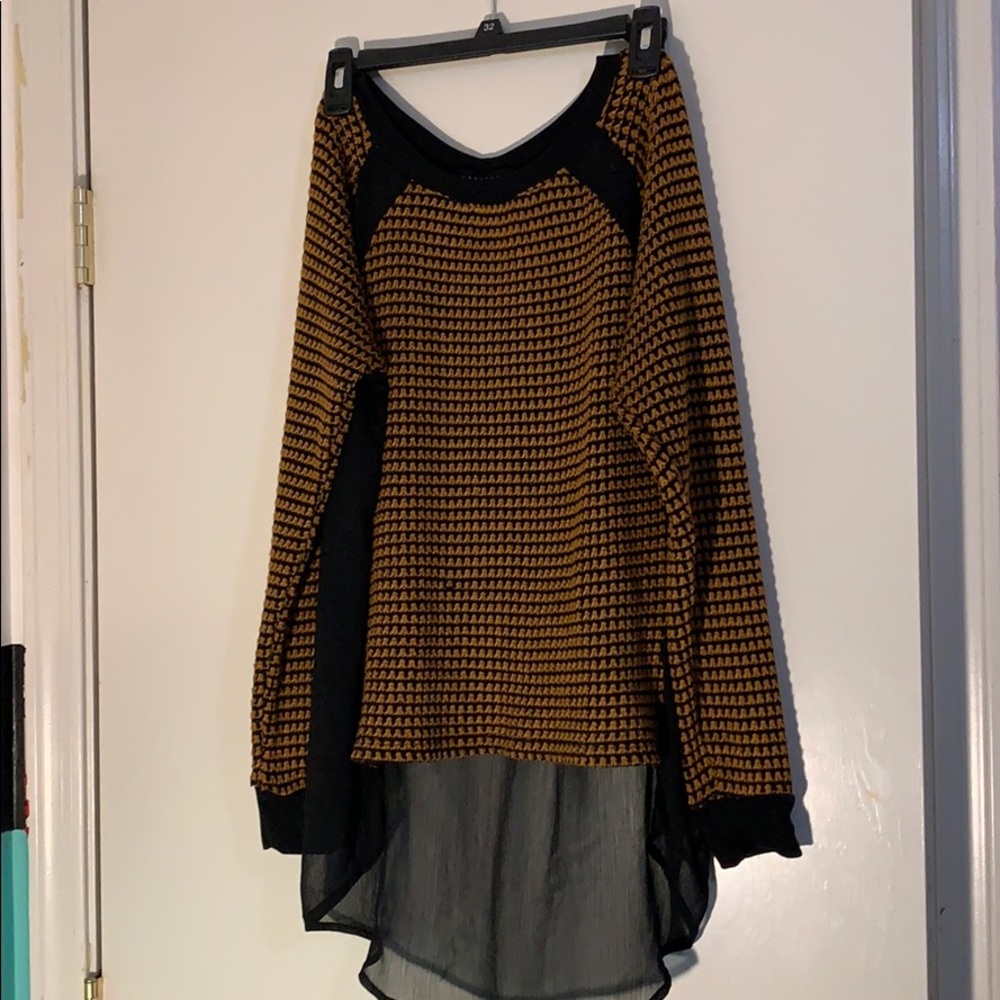 Never worn sweater with sheer back.